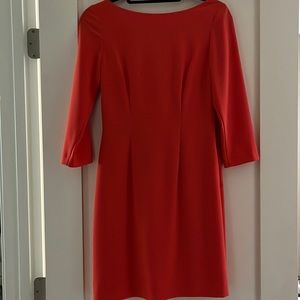 Orange midi with 3/4 length sleeves. Gianni Bini, size 2. Never worn, no tags.